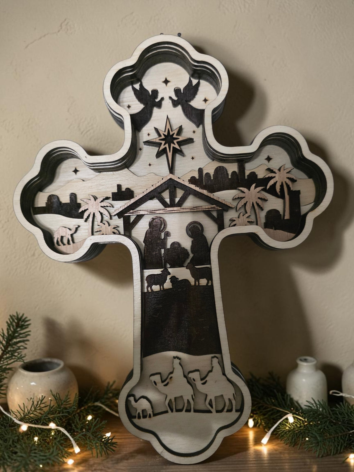 Layered wood nativity cross Christmas wall art with Bethlehem scene