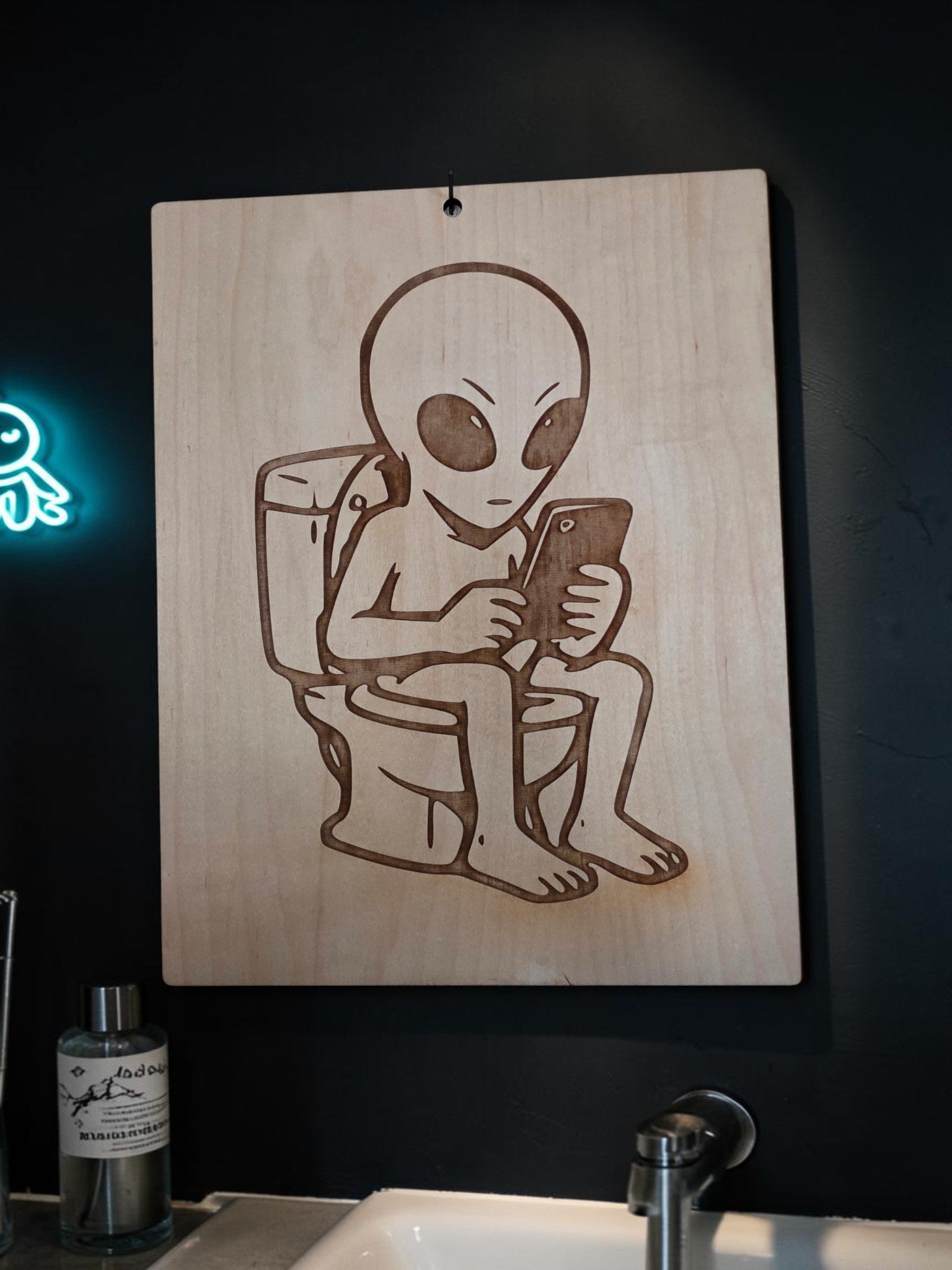 Alien on the Toilet – 11" x 17" Engraved Maple Bathroom Wall Art