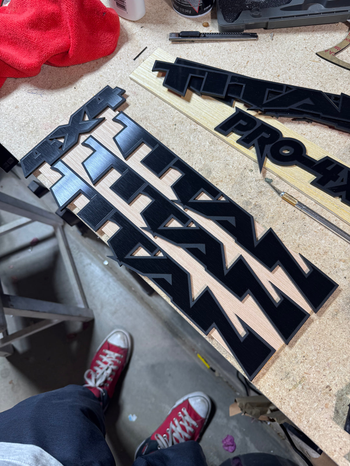 Custom Nissan Titan Emblems – 1/8″ Cast Acrylic with Black Edge & Brushed Black Inlay
