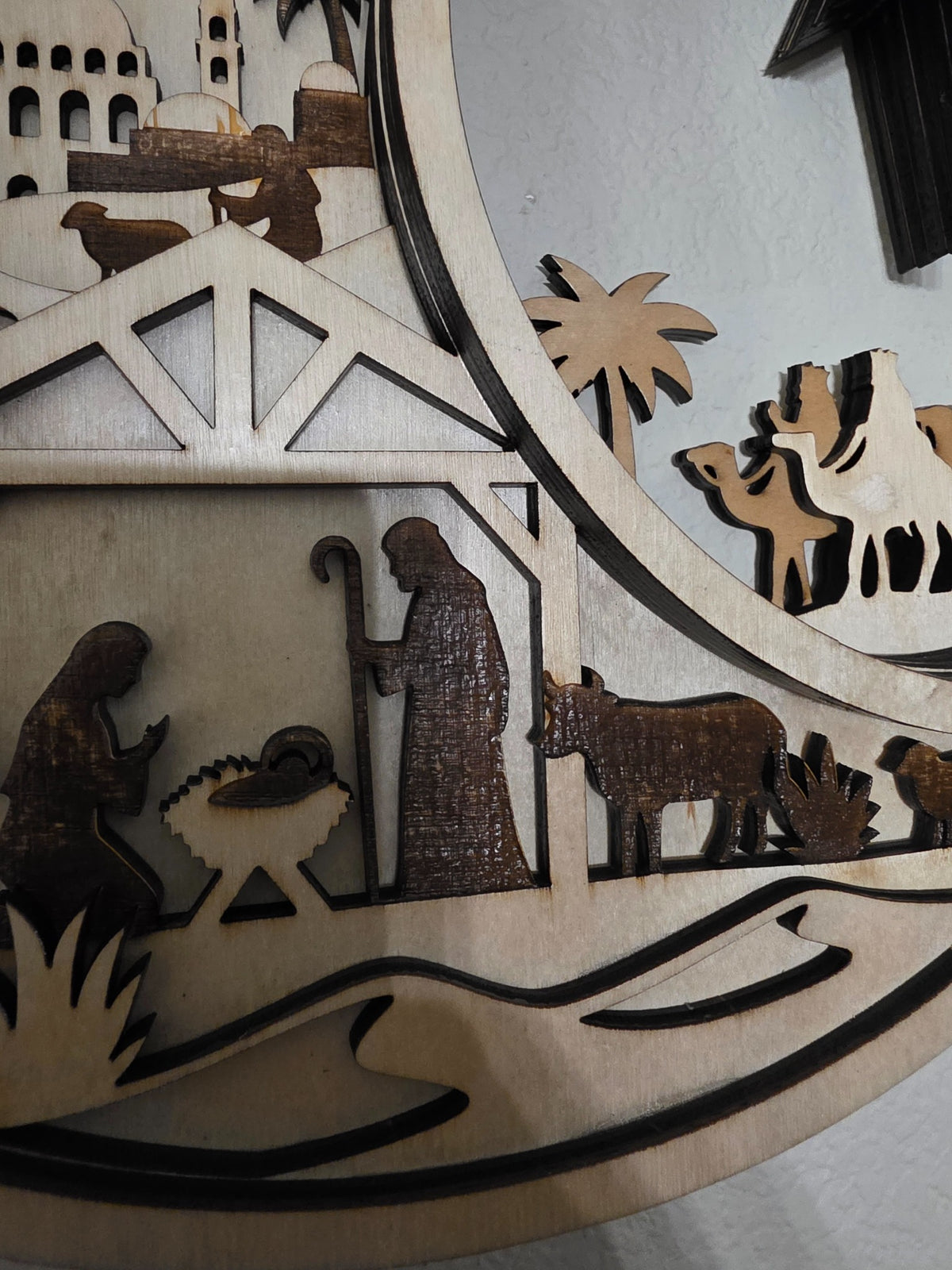 Holy Family detail on crescent moon nativity layered wood wall art
